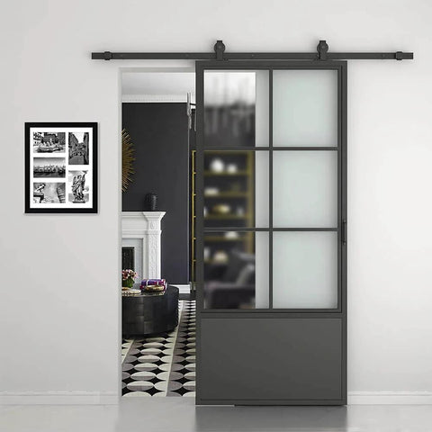 30 Inch By 84 Inch Frosted Glass Barn Door With Black Steel Frame And Three Quarter Lite Panels Ships Fully Preassembled With Sliding Hardware Kit And Door Handle For Interior Closets Bathrooms And Pantries Durable Powder Coated Finish installed in living room entryway