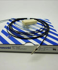 Single Replacement Fiber Optic Sensor FD43G for Industrial Automation on packaging, coiled fiber cable.