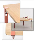 Adjustable Metal Table Legs With Signature F Shape Profile And Self Leveling Base Heavy Duty Powder Coated Steel Construction No Drill Assembly on table with wooden top.