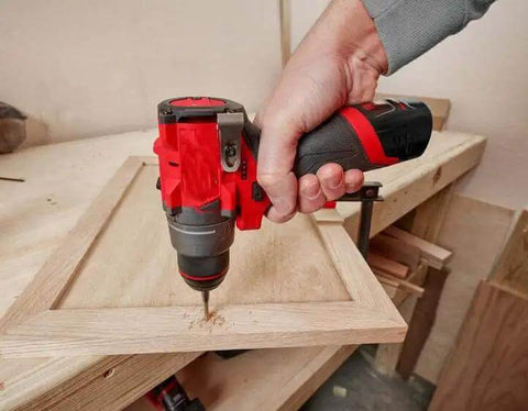 User operating a Straight Up Powerful Brushless Drill Driver Compatible With Milwaukee M12 12V Half Inch Cordless Power Tool Bare Unit on wood.