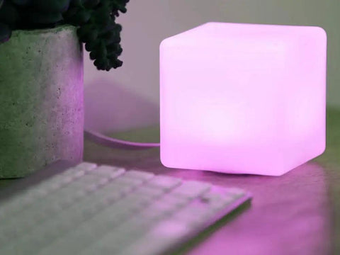 Rechargeable LED Color Changing Cube Light 8 Inch Dimmable With Remote 16 RGB Colors 4 Modes Waterproof Patio Party Ambient Decorative Lamp Perfect For Home Decor And Outdoor Gatherings glowing pink on a desk