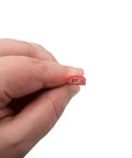 Close-up of a hand holding a wire lead from an ECM Tester For Electronically Commutated Motors With 24 Inch Leads And Carrying Case