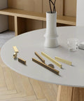 Assorted handles on table, featuring Six Pack Antique Brass Finger Pulls For Cabinets And Drawers, Solid Zinc Alloy Hardware.