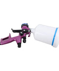 Kickass Pneumatic HVLP Paint Spray Gun Kit With 600ml Cup And 1.3mm Tip showing purple ergonomic handle and white paint cup.