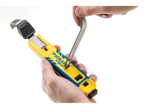 Hands adjusting 4-70 Cable Knife System For Round Cable Stripping With 28mm And 35mm Hooks Yellow One Pack tool