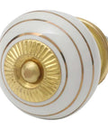 One Hundred Pack Ceramic Stripe White Drawer Knobs With Slick Gloss Finish For Kitchen Cabinet Hardware And Dresser Pulls, round knob with gold accent.