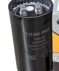 Beef Up Your AC Motor With This Dry Electrolytic Start Capacitor, 53-64 Microfarads, 330 VAC, One Quarter Inch Male Terminals, Built Tough For Industrial And Home Use In Intermittent Motor Starting, black cylindrical capacitor