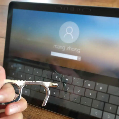No Touch Door Opener Tool With Stylus and Button Pusher used on a tablet screen, sturdy metal build, silver finish shown.