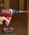 Heavy Duty 18 Volt Cordless Rig Showcasing A Boss Level Half Inch Drill drilling into wood with an auger bit, demonstrating durability.