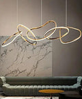 Statement Piece Stainless Steel LED Pendant Chandelier With Gold Ring Accents Adjustable Hanging Lamp For Dining Rooms above modern sofa