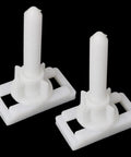 Premium Built Tough Rectangular White Plastic Toilet Seat Hinge Bolts With Nuts And Washers showing two white plastic bolts with square bases.