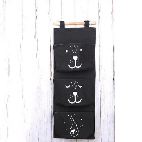 Three Pocket Wall Mounted Closet Organizer Hanging Storage For Clothes Tissue Socks Small Essentials Super Tough Cotton Linen Fabric with cute animal designs.