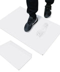 Person stepping on Super Sticky Tacky Floor Mats Grab Dirt And Dust From Shoes Like A Charm Perfect For Cleanrooms Hospitals Labs Homes And Job Sites Large 24 By 36 Inch Adhesive Pads In Case Of Five Mats With Thirty Sheets Each White