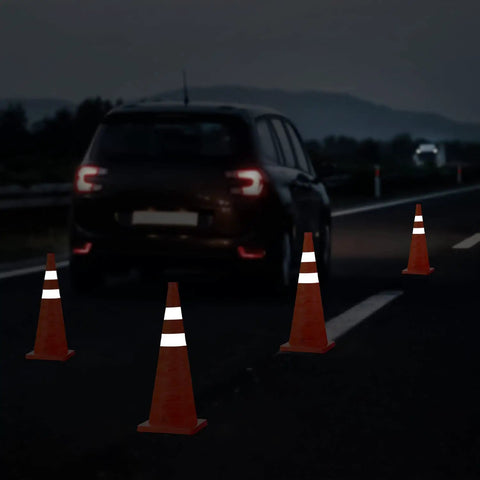 Car approaching 28 Inch Collapsible Traffic Safety Cones Pack Of 4 With Reflective Collar, Ultra Visible Orange for roadside setup