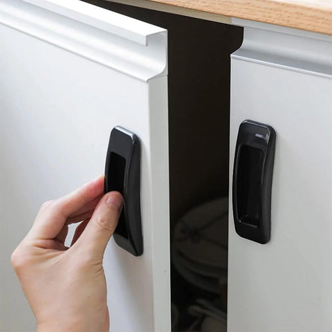 Person using Self Stick Instant Cabinet Drawer Handle Multipurpose Stick On Handle for easy opening on kitchen cabinet