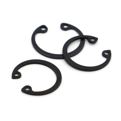 Rock Solid Black Internal Retaining Rings And C Clips M8 Through M50 Shaft Circlips, carbon steel clips on white background.