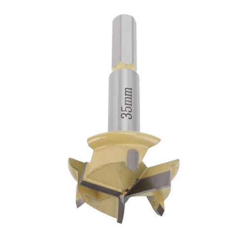 Close-up of 35mm hinge bore bit with 9mm hex shank and 3-flute cutter for woodworking
