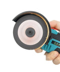 Close-up of Kickstart Your Next Big Project With This Savage 12 Volt Mini Angle Grinder cutting metal with blade in hand.