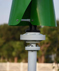Close-up of 600W 12V Vertical Wind Turbine with Maglev Axis Coreless Permanent Magnet Generator Green FRP Blades Windmill.