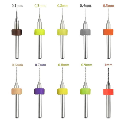 10 tungsten carbide drill bits, 0.1mm to 1.0mm, for PCB use, arranged showing symmetrical cutting edges with colored rings.