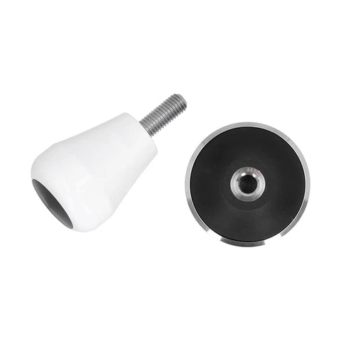 58 Millimeter Size Coffee Tamper Top Tier Stainless Espresso Press with smooth grip and flat pad components viewed from side angle.