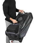 Person using Commander Catchers Gear Bag With Wheels For Travel And Outdoor Play Black Rugged Durable Equipment Carrier