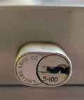 Close-up of S100 lock on a cabinet, highlighting compatibility with Heavy Duty Office Cabinet Replacement Key For S110 Core.