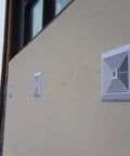 Three reinforced plastic return air grilles for sidewall or ceiling vents, sleek square 11.8 x 11.8 inches, mounted on an exterior wall.