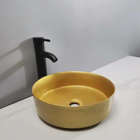 Bathroom Sink Bathroom Sink Home Bathroom Vessel Sink Modern Art Basin Hotel Apartment Bathroom Wash Basin Round Golden Counter Basin Bathroom Sink Vessel on countertop with black faucet.