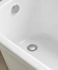 Rotary Bath Tub Plug Drain Stopper for Bathtub Overflow Cover installed in a white bathtub, showcasing its sleek chrome design.