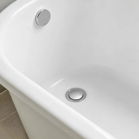 Copper Bathtub Drain Stopper with One Press Seal and Adjustable Height in a white tub, showcasing a chrome drain cover.
