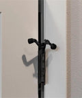 Two Point Two Inch Jumbo Hinge Pin Door Stop With Adjustable 85-125 Degrees, Zinc Alloy, Matte Black Finish installed on door