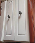 Metal Flower Shape Pull Handle Cabinet Knob Bronze Tone Set Of 8 With Screws For Doors And Drawers installed on white cabinets.