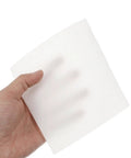 Hand holding a six inch Top Shelf Lint Free Cleaning Wipes oil absorbing cleanroom cloth for office desks and screens.
