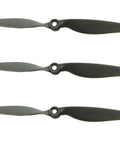 Three black 7x4 Slow-Fly Drone Propellers, 7 Inch Replacement Prop Set For Quads, 3 Pack, shown horizontally, durable plastic material