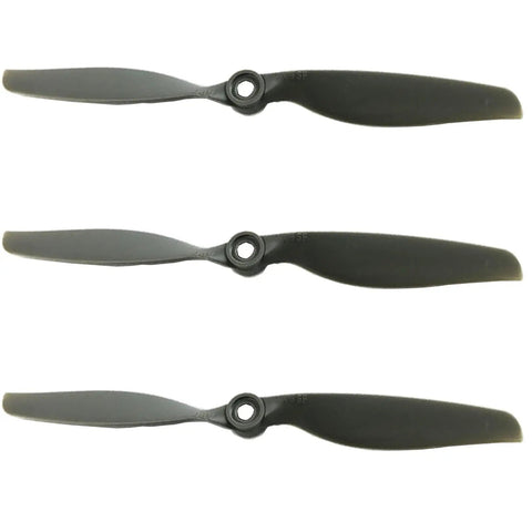 Three black 7x4 Slow-Fly Drone Propellers, 7 Inch Replacement Prop Set For Quads, 3 Pack, shown horizontally, durable plastic material