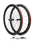 700C Carbon Fiber Wheelset With 50mm Fat Rim For Road Bikes V Brake Compatible Quick Release Front 100mm Rear 130mm Supports 7 To 11 Speed Cassette depicted with sturdy stainless spokes and beefy aluminum hub.