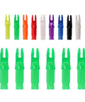 Colored arrow nocks with focus on Green Press-In Arrow Nocks For Carbon Arrows.244/.246 Throat, 50 Pack Plastic Nocks