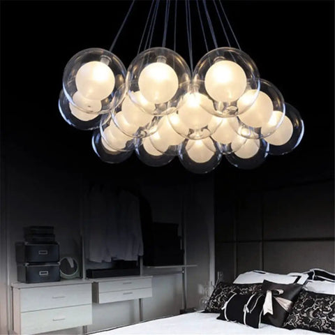 Drop Dead Stunning Modern Glass Pendant Chandelier With Polished Chrome Finish And Efficient Led G4 Bulbs, overhead view with multiple glass shades.