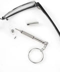 3 In 1 Glasses Screwdriver Kit With Keychain Holder for Eyewear and Small Devices shown next to glasses with detached parts