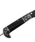 Close-up of all-black sharp edge folding sickle with wooden handle, ornate design detail, two-section grass cutter.