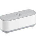 Portable Ultrasonic Jewelry Cleaner For Rings Silver Watches Retainers And Glasses Compact Countertop Machine in white and gray design.