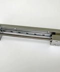 Side view of linear stage actuator with screw drive and guide rail, silver aluminum, NEMA 14 motor, 150mm length