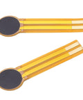 Two FLEXMAN thin-film pressure sensors with round black sensing pads and yellow flex circuits.