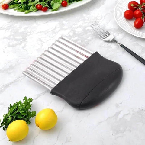 Crinkle cutter with stainless steel blades and black plastic handle for potatoes and vegetables.