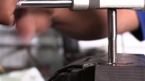 High Speed Steel Plug Tap M45 X 1.5 For Cutting And Repairing Threads Dope HSS Hand Tap in use with metalwork piece