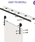 Installation diagram of 6Ft Barn Door Hardware Kit Lite Version Black - Smooth Quiet Sliding Track Rail System, Easy Install shown