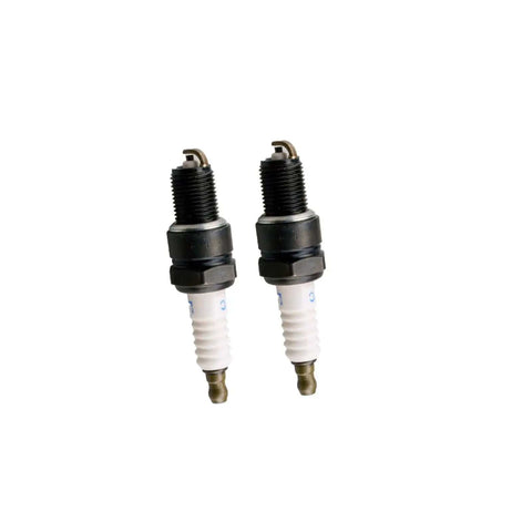 Two spark plugs compatible with Plug And Play No Hassle Replacement Starter Motor For Timecutter and lawn tractors with V Twin engines