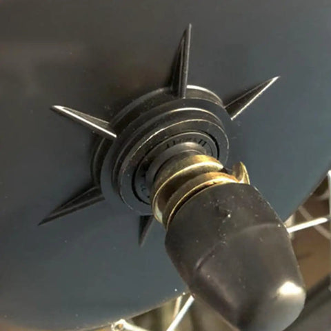 Close-up of Electric Bike Wheel Lock Nuts And Hub Motor Mounting Screw Set M14 with Safety Washers on a black motor hub.
