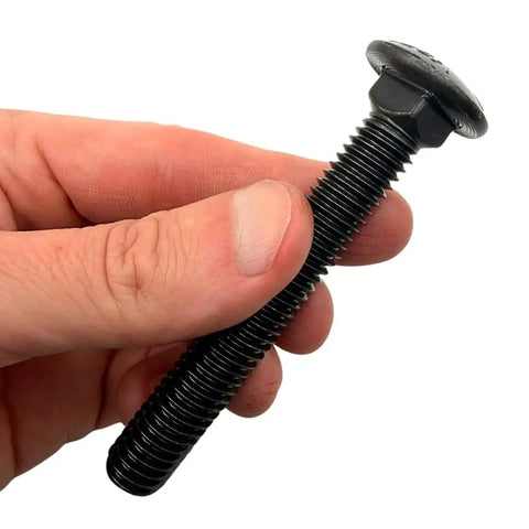 Beefy One Half Inch Carriage Bolts With Thirteen Threads Per Inch, Three And One Half Inch Long, Grade Eight, Ten Pack, Heavy Duty Round Head Square Neck, Black Oxide Finish, SAE J429 held in hand